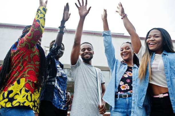 Young African students smiling together in a classroom